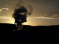 Old Faithful slumbers at sunset.jpg